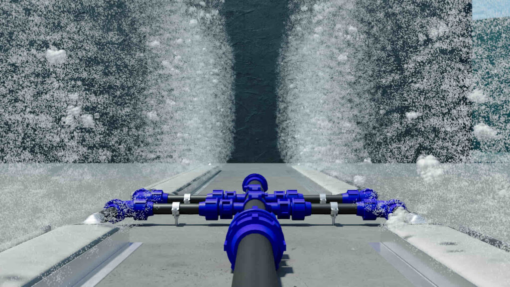 Visualizzazione fotorealistica di un sistema di aerazione industriale in funzione all'interno di una vasca di trattamento.